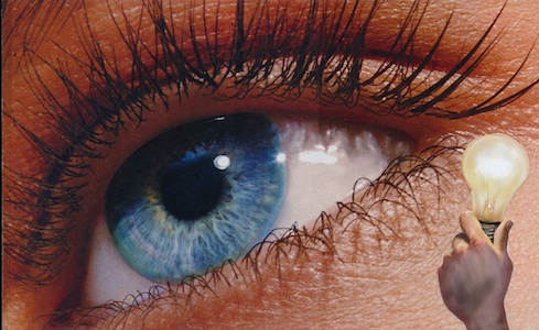 SoulCollage® image of an eye beside a hand holding a light bulb